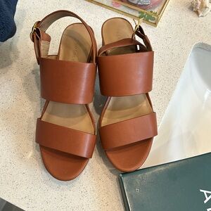 New, never worn brown sandle heels